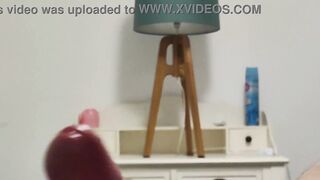 My busty girlfriend masturbates me while I watch porn on TV