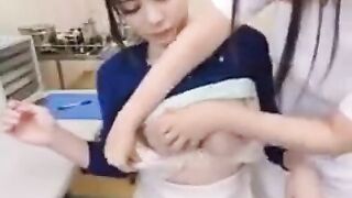 Busty Japanese girl seeing a doctor. Any one know who she is??