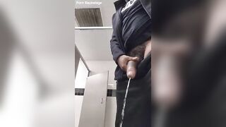 HUGE ROLL MALE PISSING IN THE BATHROOM