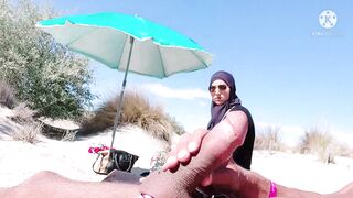 I shocked this muslim by pulling my cock out on the public beach, OMG her husband will be here soon