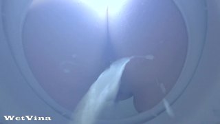 Sweet anal enema with pee inside toilet bowl