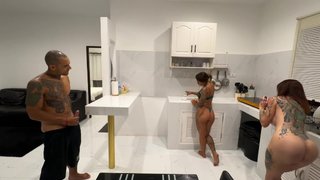 Having sex with my girlfriend's friend in the kitchen.