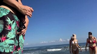 Lucky man meets two horny girls on the beach while masturbating in public
