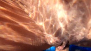 AN EXUBERANT MILF PENETRATED UNDERWATER
