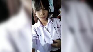 Cute young Thai girl shows her big boobs and pretty pussy