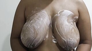 Indian girl thecatwoman23 bathing her boobs in foam