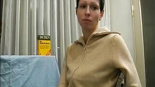 Short haired teen fisting herself