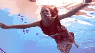 Three girls with Matrosova in swimming pools