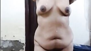 Indian aunty spitting saliva all over her body