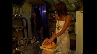 Sexy cook banged by a muscly man in the kitchen