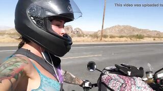felicity feline riding on aprilia tuono motorcycle