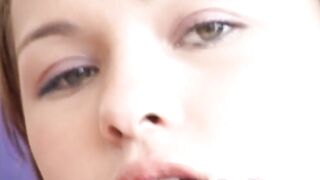 Shaved teen masturbates in solo scene