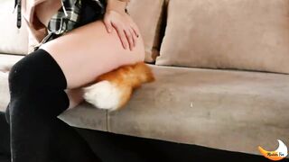 A schoolgirl with a fox tail is having fun. MadamFox