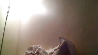 Naughty Asian Babe Gets Naked